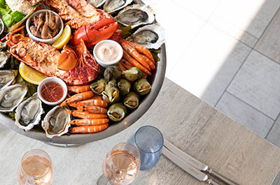 Seafood platter with oysters, whelks, shrimp and lobster